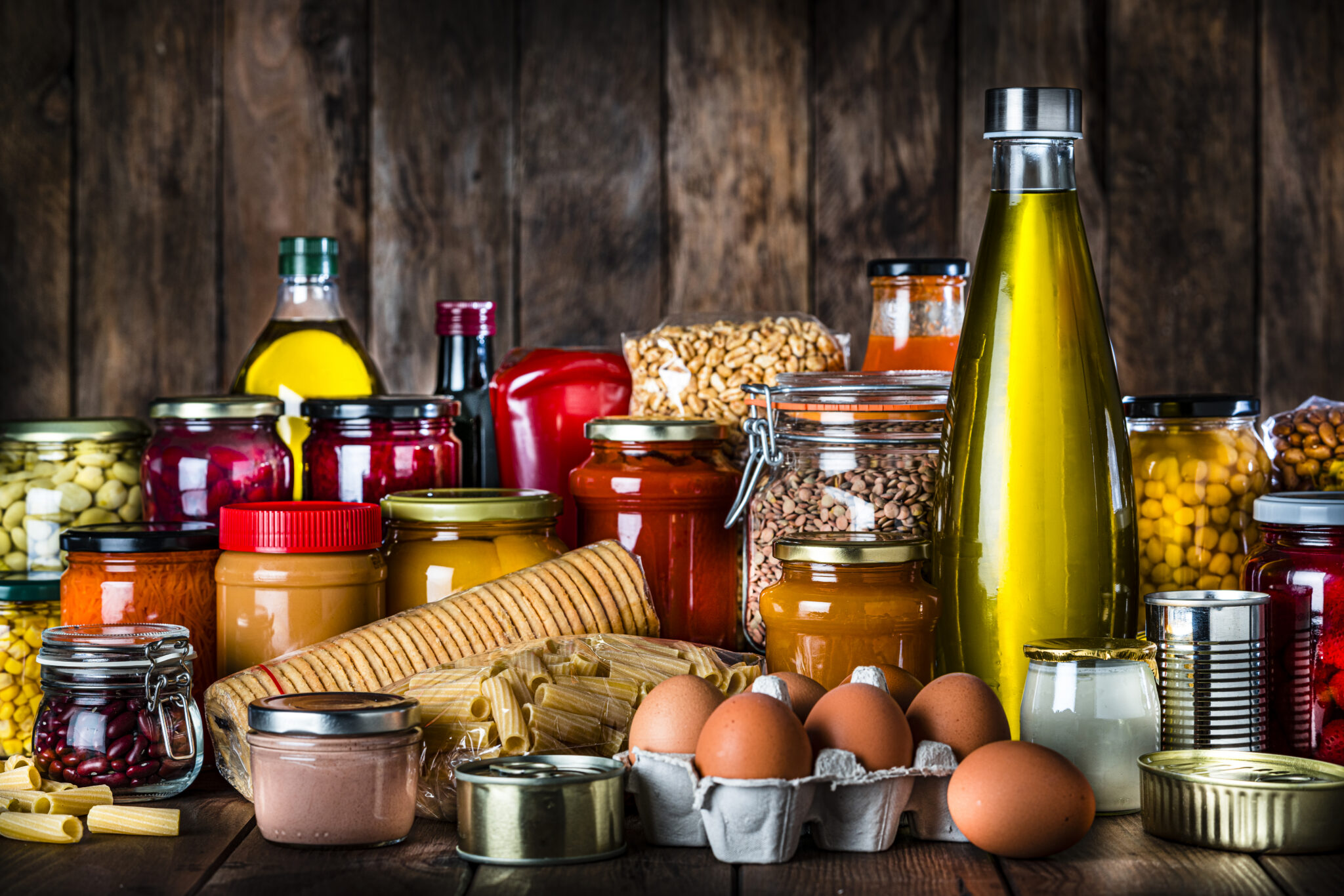 non perishable food on rustic wooden table. copy space
